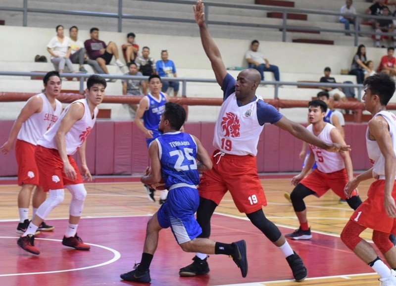 Red Lions big man Donaldo Tankoua is seen screening an opposing player