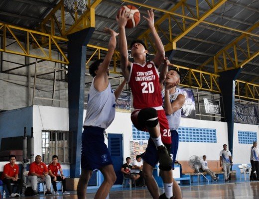 Justine Sanchez of San Beda goes up for a layup against Arellano Brave defenders (Fr. Martin's Cup photo)
