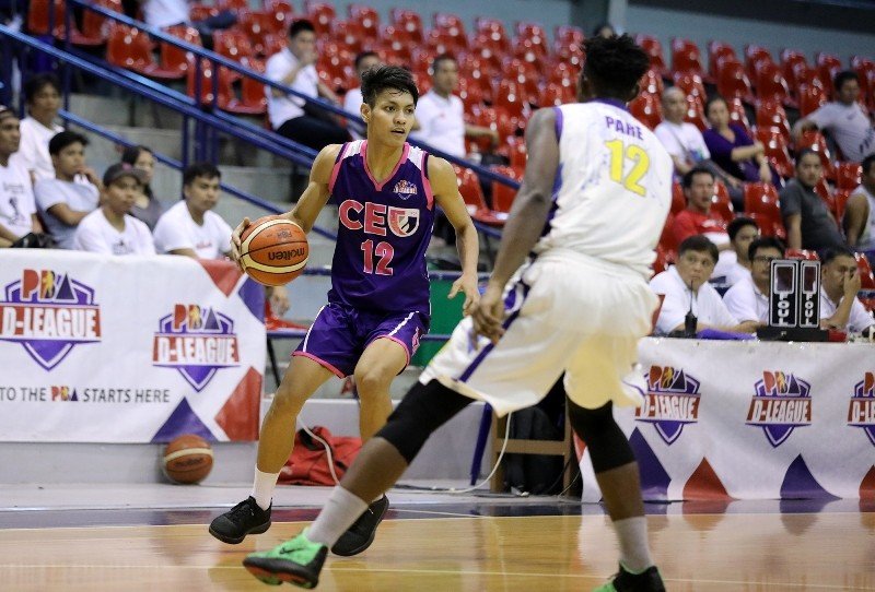 Jerome Santos of CEU guarded by Mohammad Pare of St. Clare College (PBA Images) 