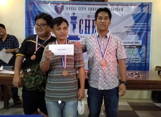 Photo shows Arena Grandmaster (AGM) Almario Marlon Quiroz Bernardino Jr., Patrick Bonifacio and Genghis Katipunan Imperial receive P10,000 and a medals for their efforts helping Pasig Team 4 into an 3rd place finish during the closing rites of the 1st Hampton Gardens Chess Team Tournament