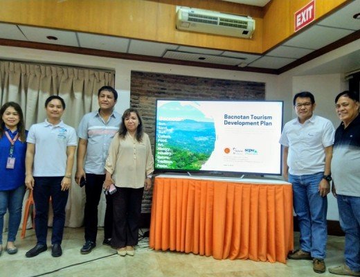 From left, Municipal Planning and Development Officer Francia Gonzales, Consultant Aaron Lecciones of the Society for the Conservation of Philippine Wetlands, Bacnotan Mayor Francisco Angelito Fontanilla, Vice Mayor Divine Fontanilla, Holcim Bacnotan Plant Manager Erano Santos and Sangguniang Bayan Member Frank Almodovar after the turnover of the masterplan
