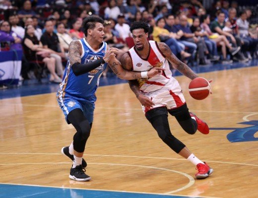 JP Erram of NLEX guards Chris McCollough of San Miguel (PBA Images)