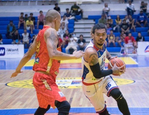 Mon Mabayo of the QC Capitals drives against Mark Yee of Davao Occidental. (MPBL photo)