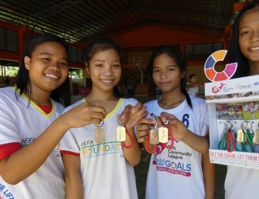 GCL players in Tacloban promote the keychains.