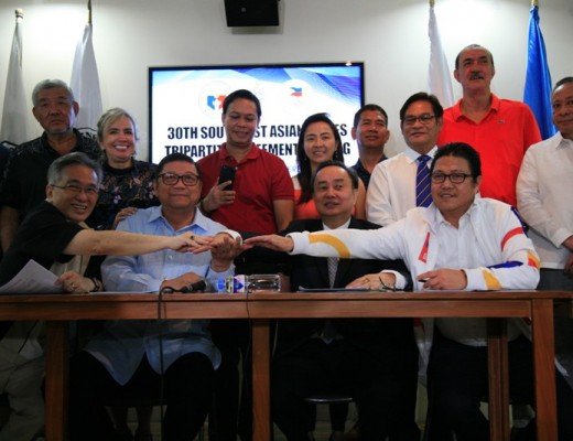 POC legal counsel Atty. Al Agra, POC Treasurer Julian Camacho, Board Member Cynthia Carrion, PSC Commissioner Charles Maxey, POC Auditor Jonne Go, PSC Commissioner Arnold Agustin, PHISGOC Director for legal Atty. Jarie Osias, PSC Commissioner Ramon Fernandez and PHISGOC Director for Protocol and IR Porfirio Mayo stand as witness for the signing.