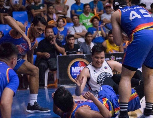 Players of SOCCSKSARGEN and Caloocan enjoy the moment after battling for the loose ball