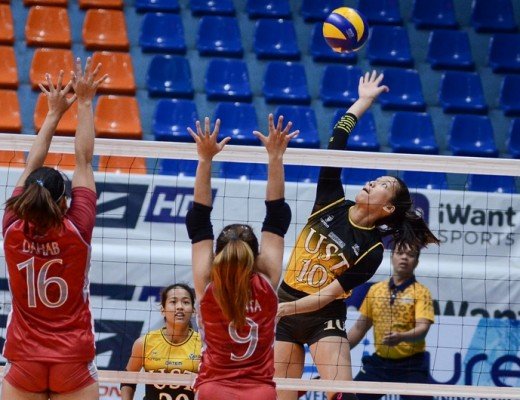 UST’s Janna Torres soars for a tip against Lyceum’s Zonki Dahab
