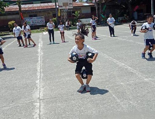 FOOTBALL RACE. These kids have fun playing the football race during the Sports for Peace Children's Games held at Holy Cross of Malita, Davao Occidental on September 7. PSC MINDANAO
