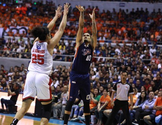 Bryan Faundo of the Meralco Bolts goes up for a shot against Japeth Aguilar of Barangay Ginebera. (PBA Images)