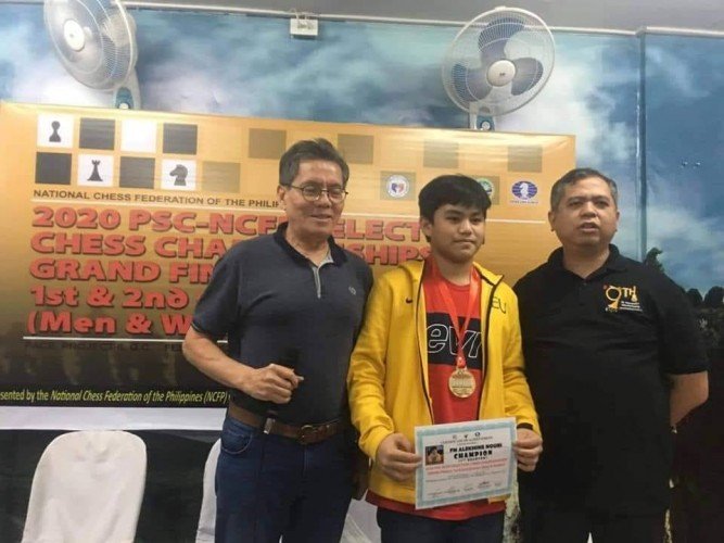 Photo shows FIDE Master Alekhine Nouri, youngest participant at 14 years old, a grade 7 pupil of FEU-Fern Diliman, Quezon City (center) displaying his certificate and the gold medal during the awarding closing rites of the the Philippine Sports Commission-National Chess Federation of the Philippines selection process (Standard event) at the PACE headquarters in Quezon City last Friday. Also in the photo are Asia's First chess grandmaster Eugene Torre and newly-installed NCFP executive director Atty. Cliburn Anthony Orbe