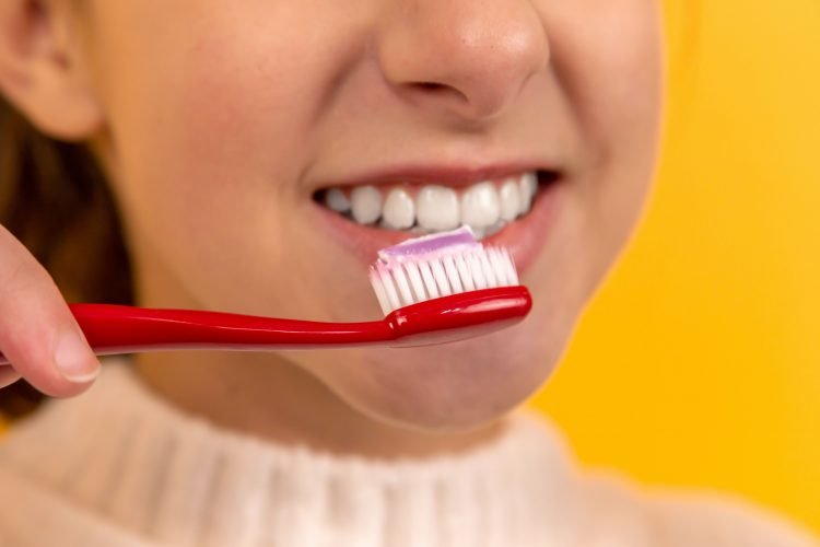 brushing teeth, whitening [Photo by Diana Polekhina on Unsplash]