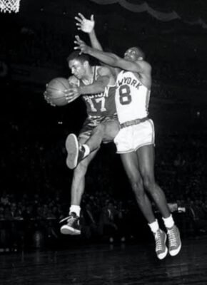 Boston's Don Barksdale hauls down a rebound against the New York Knicks.