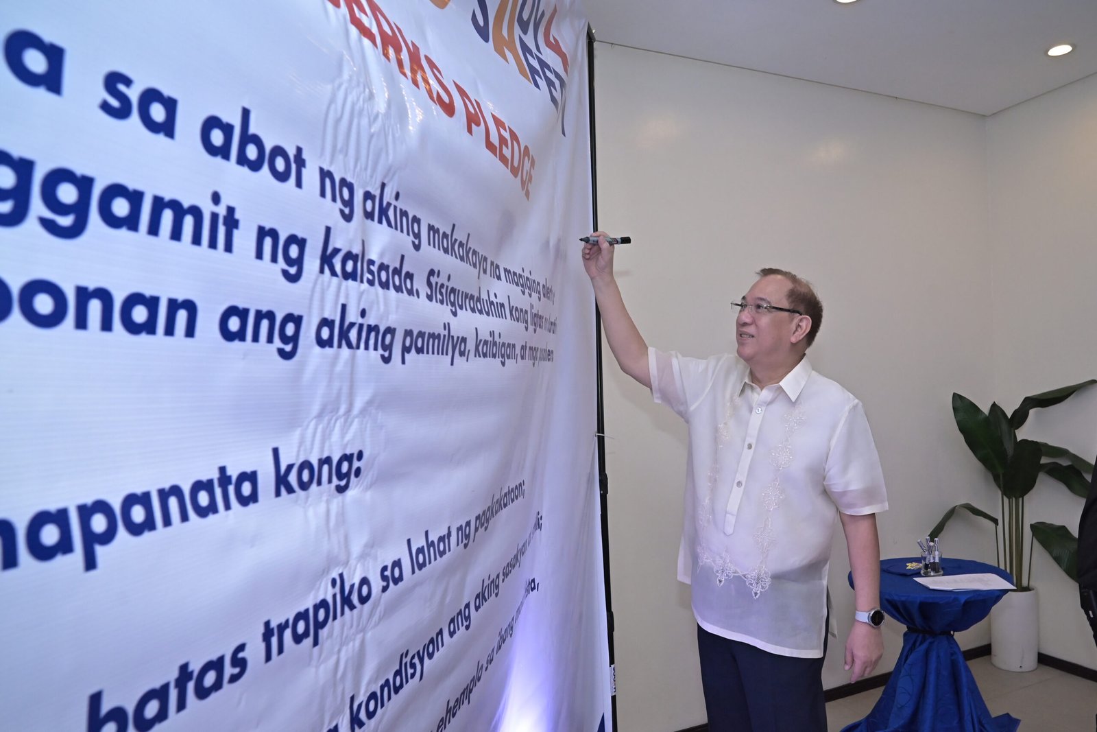 MPTC President and CEO Jose Ma. K. Lim leads the signing of pledge of commitment for road safety