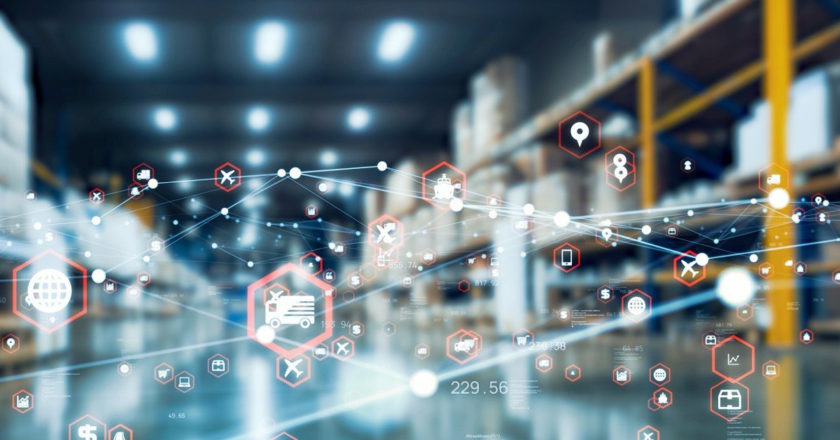 A blurred photograph of the interior of a distribution center with graphics showing logistical and transportation icons.