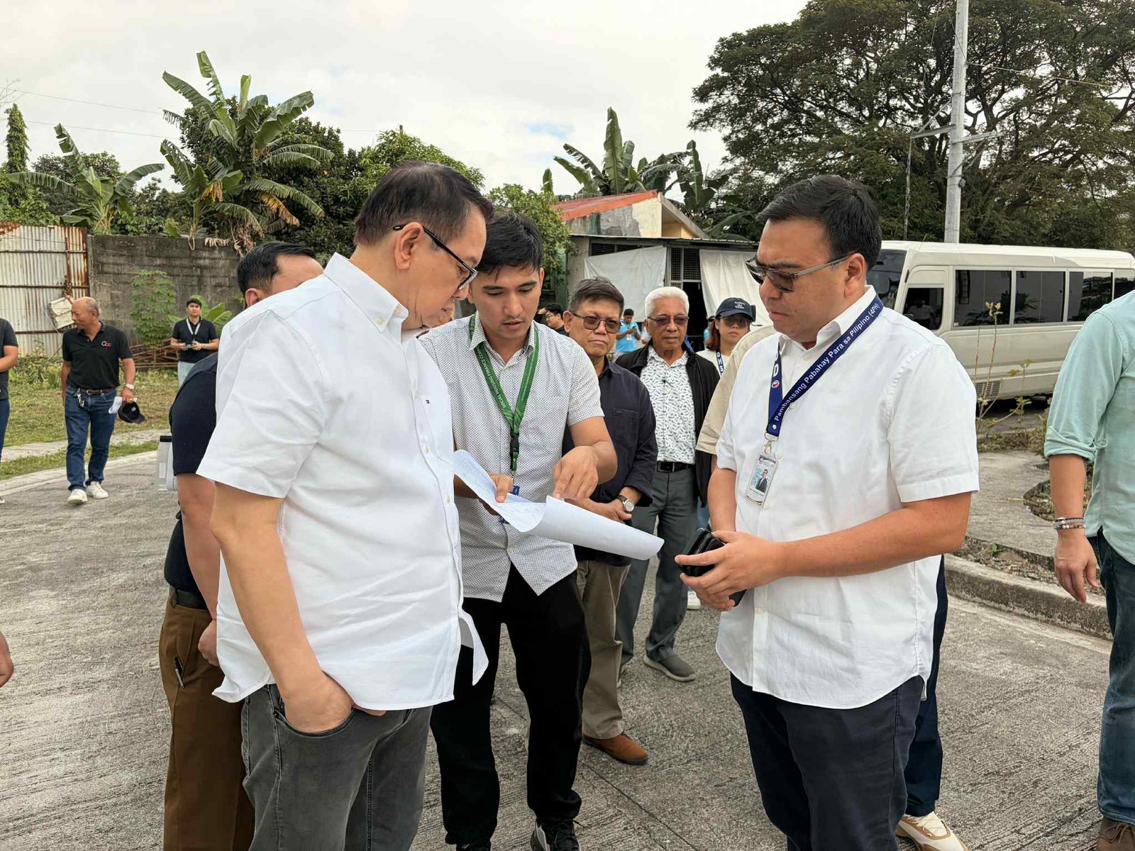 SHFC President Federico Laxa and DHSUD Secretary Jose Ramon Aliling review construction progress in Caloocan City’s HDH project.