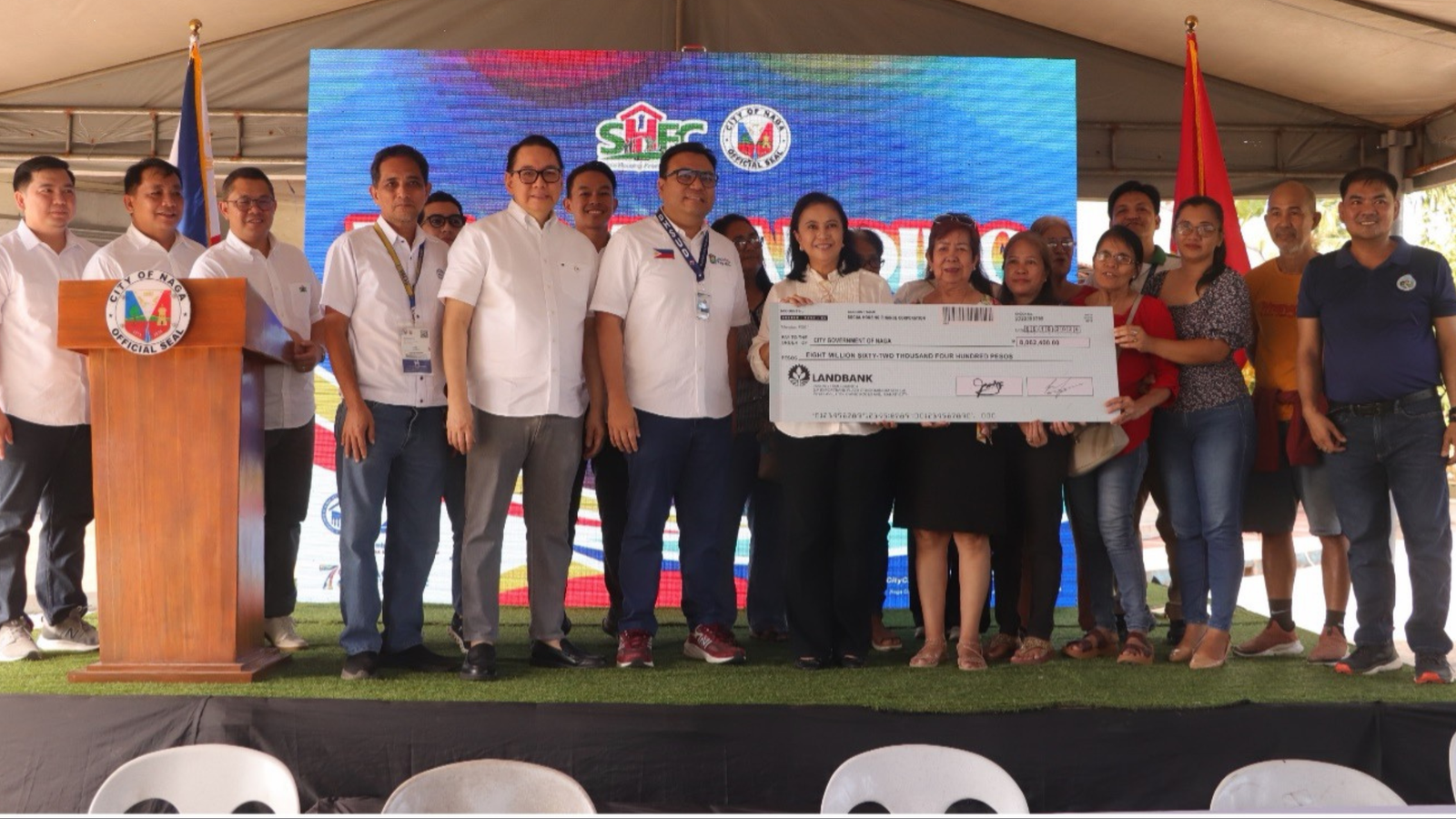 SHFC officials during a check awarding ceremony.