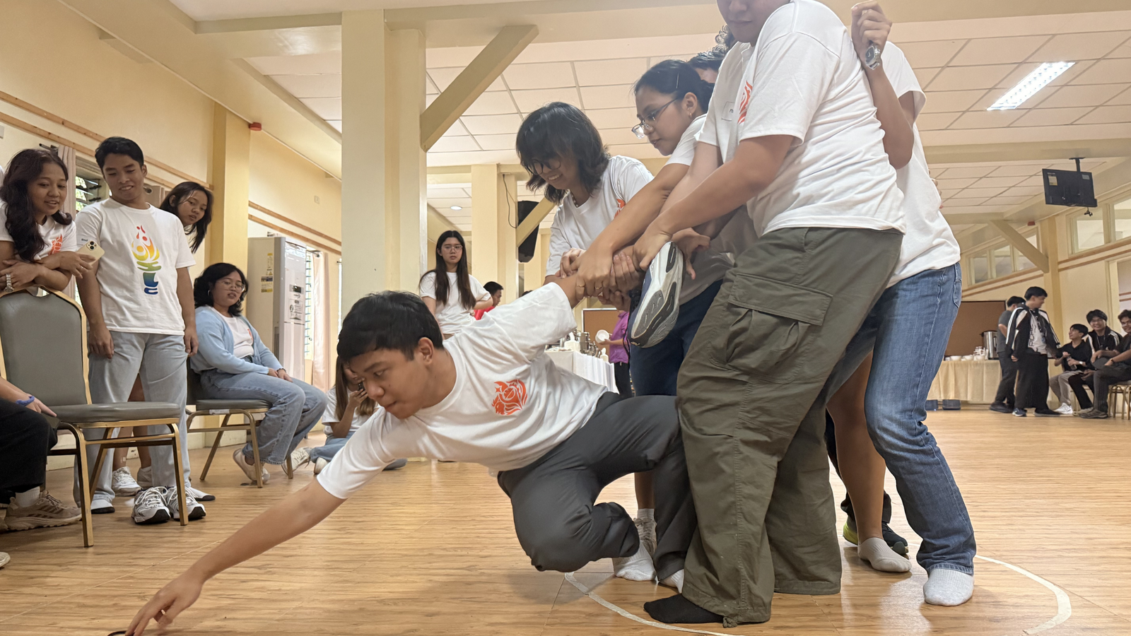 Participants take part in one of the Team‑Building Activities, fostering camaraderie and teamwork.