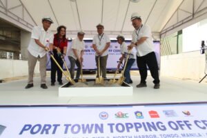 A major housing project in Tondo has reached its topping-off stage as government agencies push forward with vertical housing developments.
