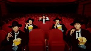 The Jet Boy Bangerz in coordinated suit styling during performance sequences