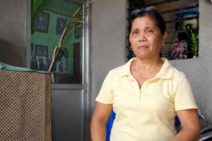 Filipino market vendors and small business owners represent communities served by accessible microinsurance solutions.